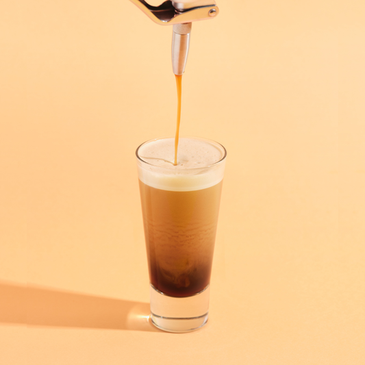 Nitro Kafo nitro cold brew coffee maker dispensing creamy stout coffee. No cream no dairy no sugar