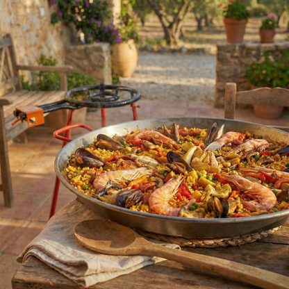 Garcima Mediterraneo authentic carbon steel paella pan with outdoor gas burner set.