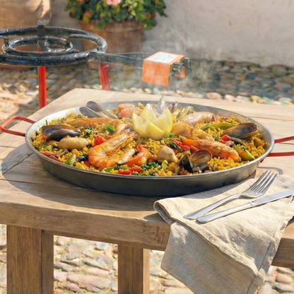 20-inch Garcima Tabarca paella pan and heavy-duty gas burner kit. Paella dish Tabarca outdoors
