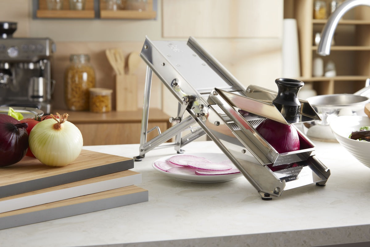 L'Héritage professional stainless steel French mandoline slicer with adjustable blades. Precision slicing red onion. Fermented food. Protection Chariot. 